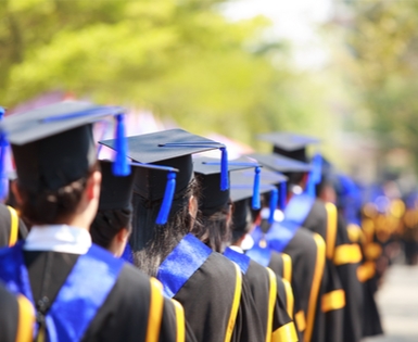 Happy students completing Bachelor's Degree Completion Program