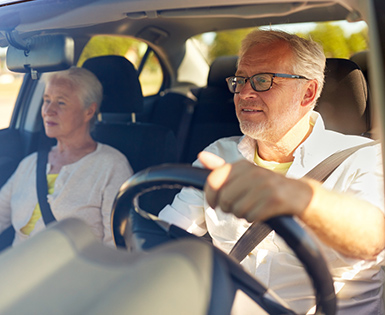 Man and woman driving in car 